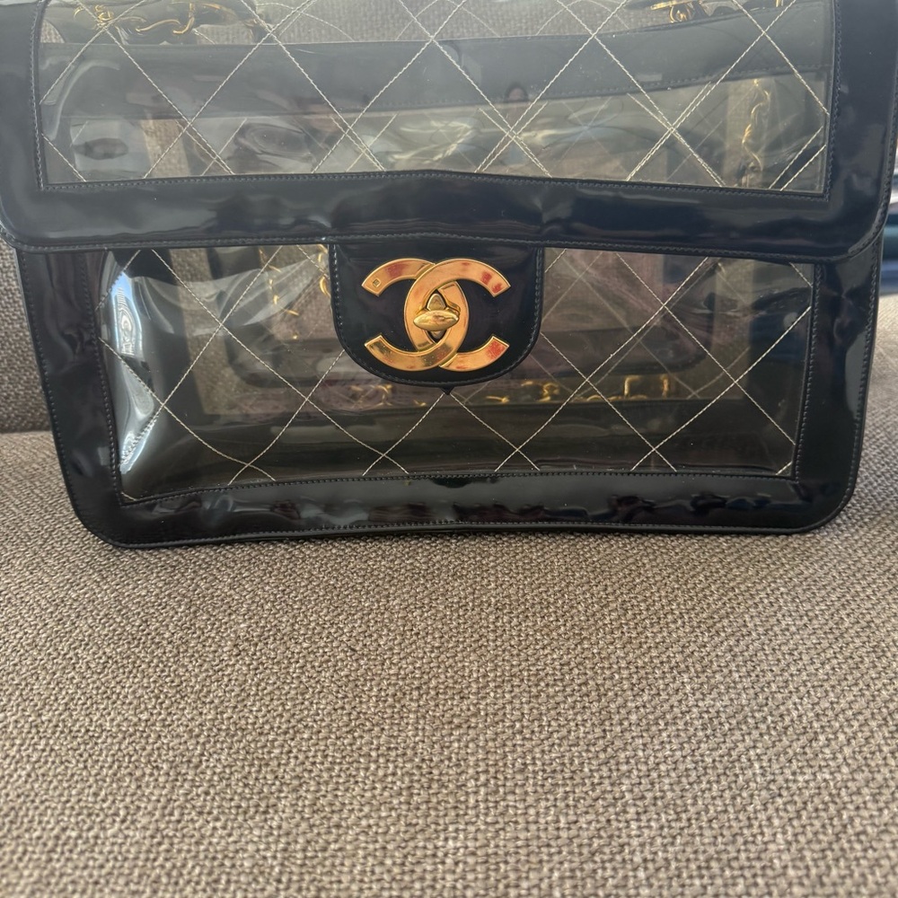 CHANEL Transparent Bag with Black and Gold Accents